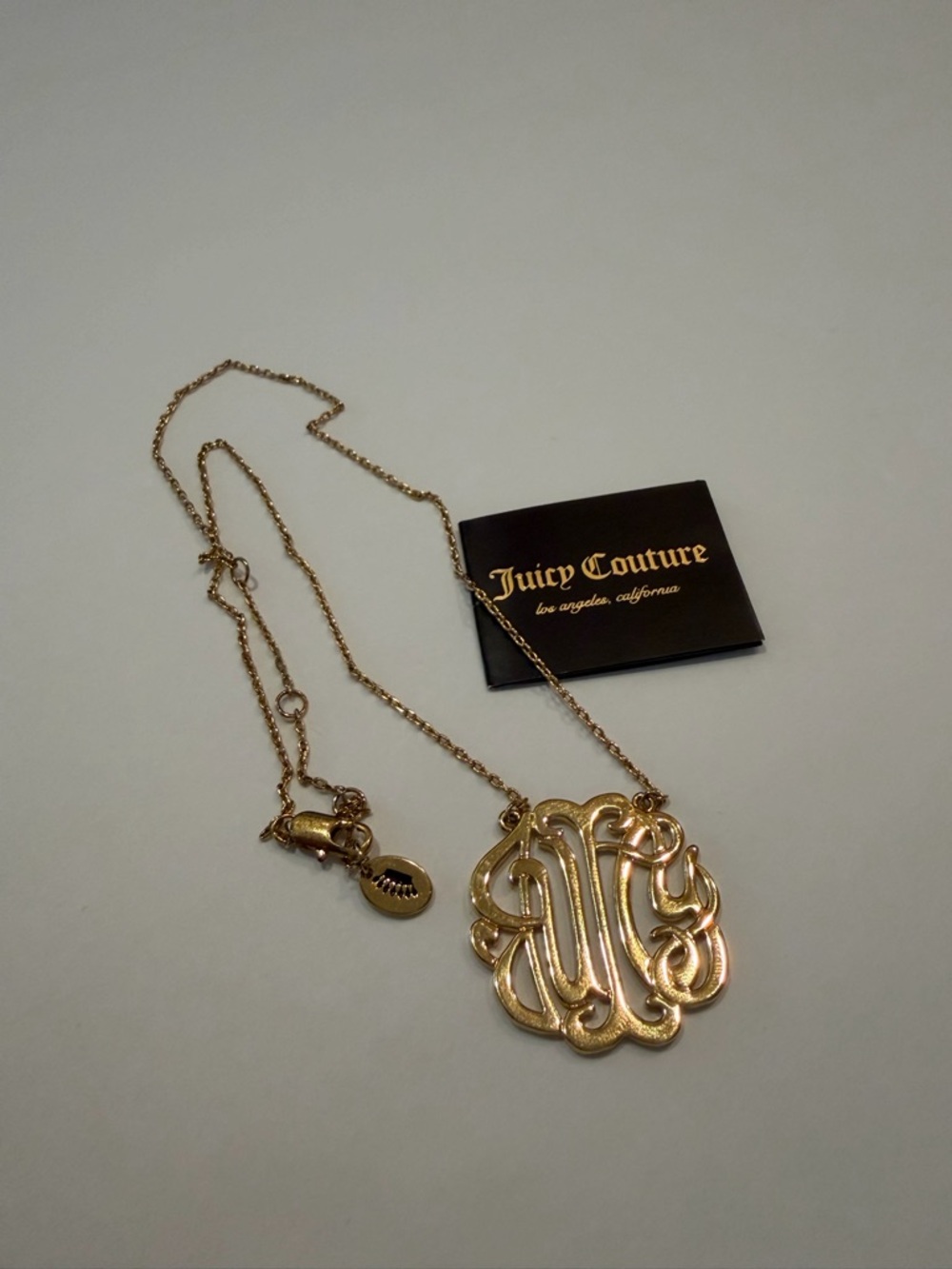 Juicy Couture Gold Filigree Monogram Necklace